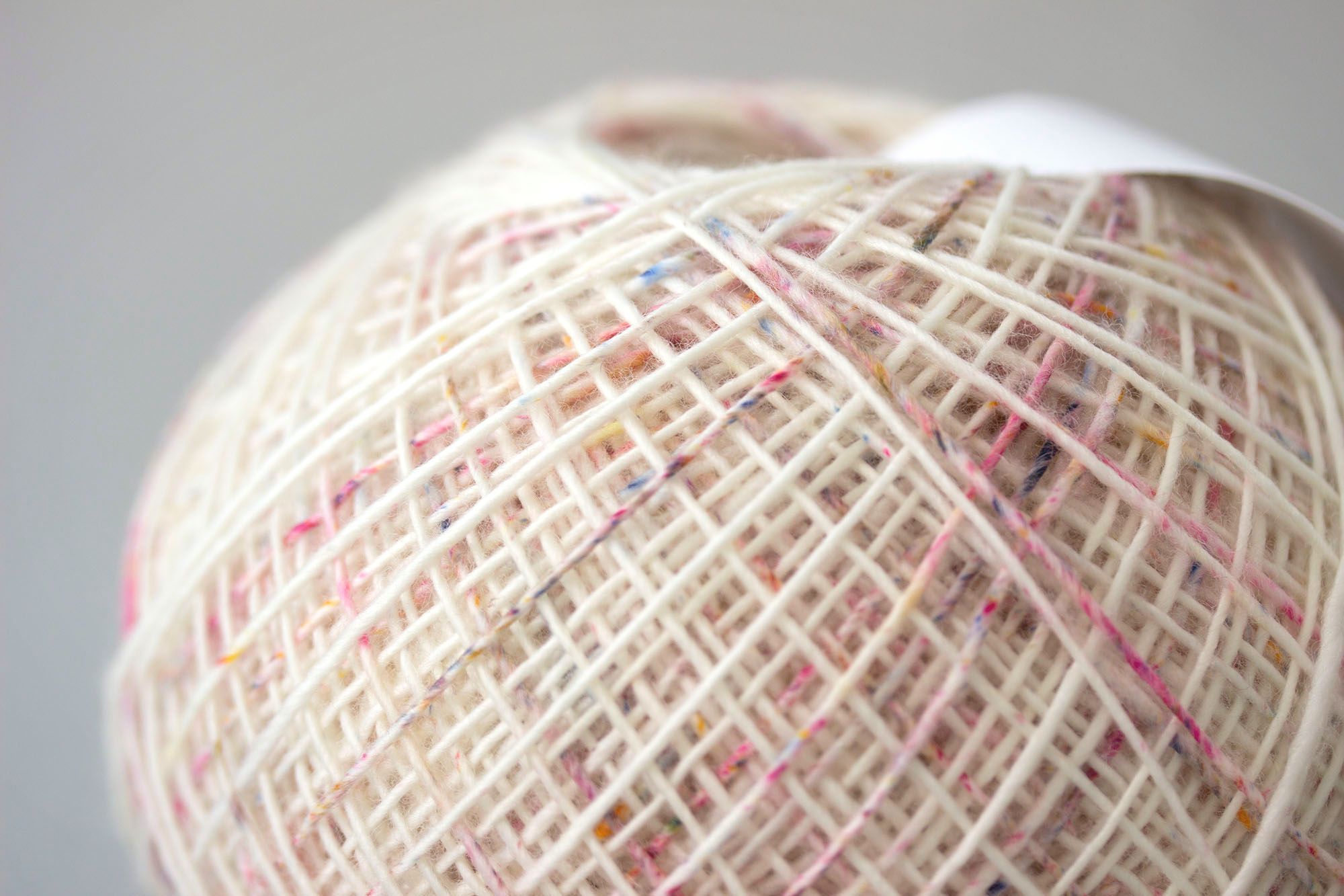 Macro detail of a speckled yarn ball